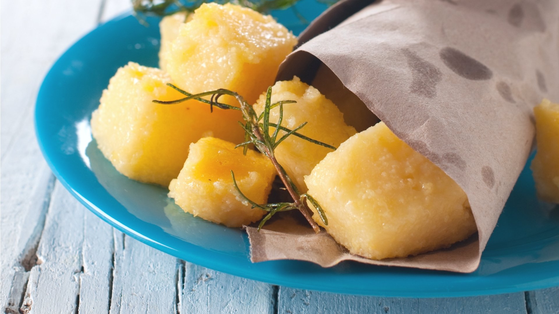 Low FODMAP roasted polenta bites with cheese and herbs by Monash FODMAP